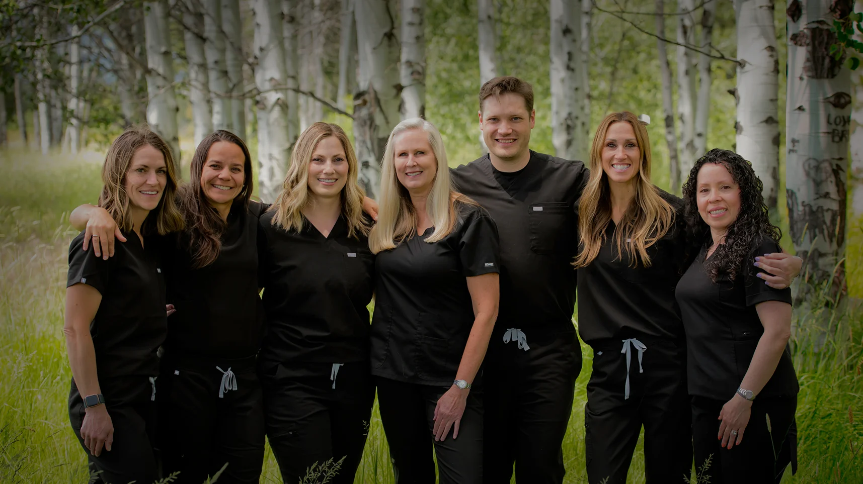 White logo for Pine Desert Dental on a transparent background.