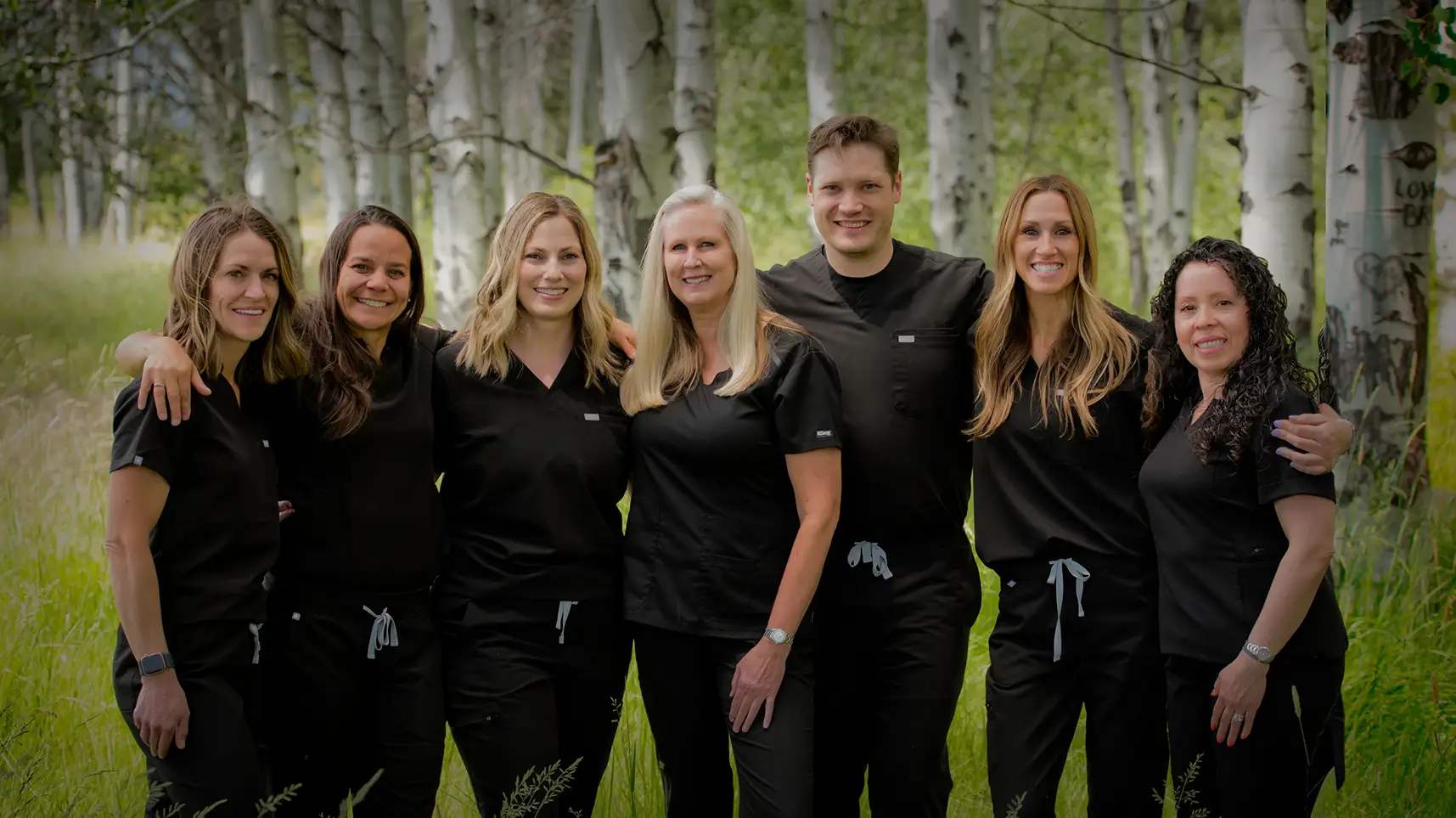 White logo for Pine Desert Dental on a transparent background.