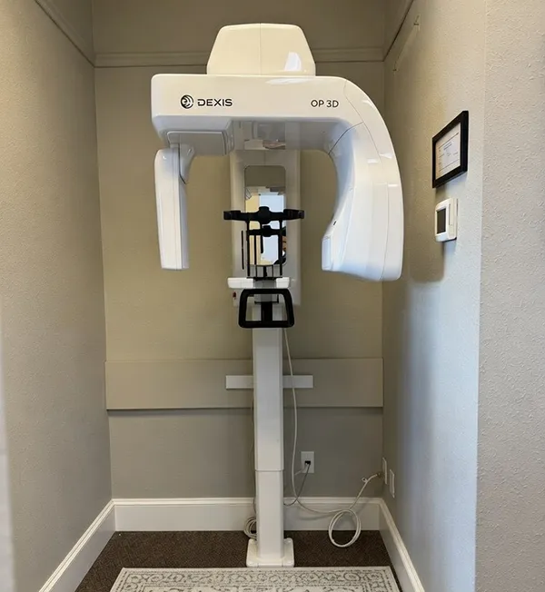 Cone Beam CT scanner capturing 3D dental images for implants.