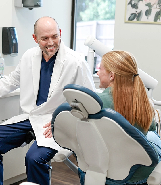 Birmingham Smiles logo featuring a tooth design and text.