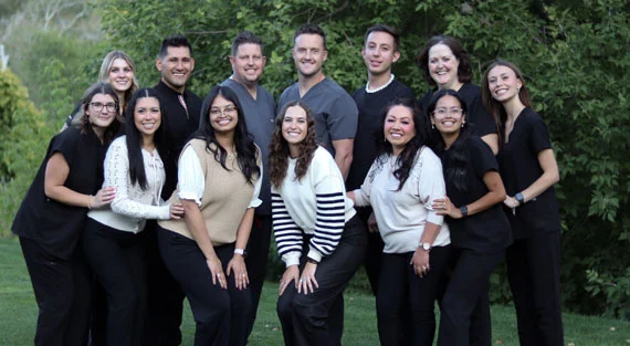 Dental team providing personalized care to families in a modern clinic.