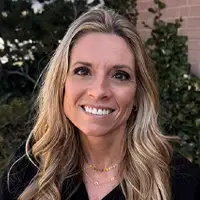 Headshot of Summer, a dental hygienist with a warm smile.